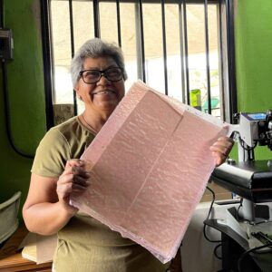 Adela Bonilla's pilot project 'ReCREA' takes solid waste materials and repurposes them into products like pencil cases and notebooks.