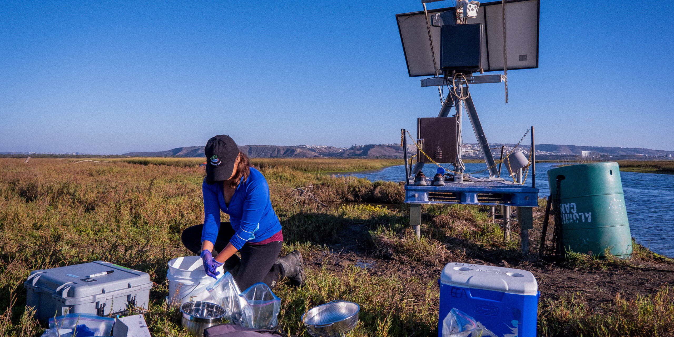Student researcher Nancy Torres washes and separates the samples she's collected into multiple composites in the Tijuana Estuary.