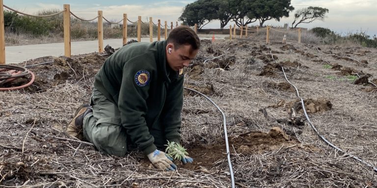 ESI Alex Mouritzen works on habitat enhancement on Monument Mesa.