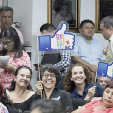 People smiling celebrating the plastic bag ban in Tijuana.